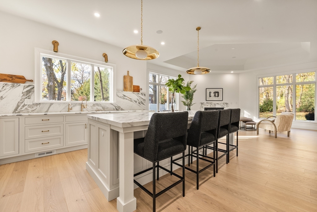335 Heath Street Brookline, MA 02467 - Photo 10 of 38 a view of a dining room with furniture window and outside view