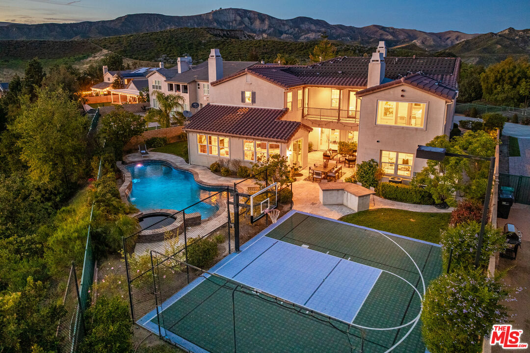3447 Sentinel Court Simi Valley, CA 93065 - Photo 1 of 19 an aerial view of a house with a big yard