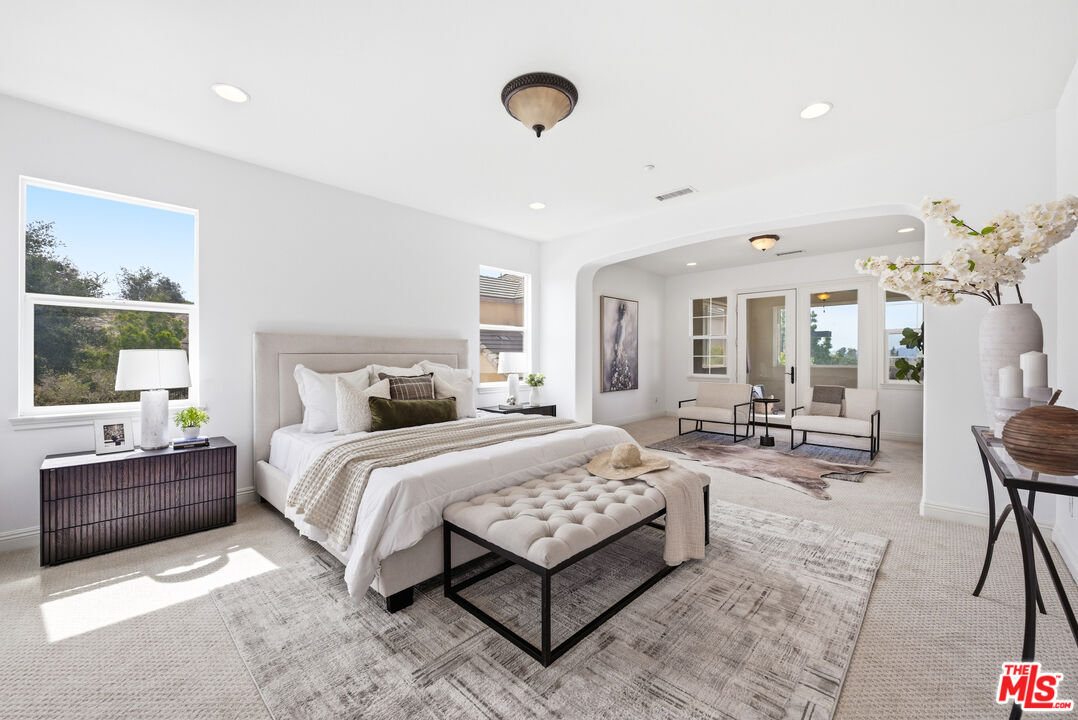 3447 Sentinel Court Simi Valley, CA 93065 - Photo 12 of 19 a bedroom with a bed and window