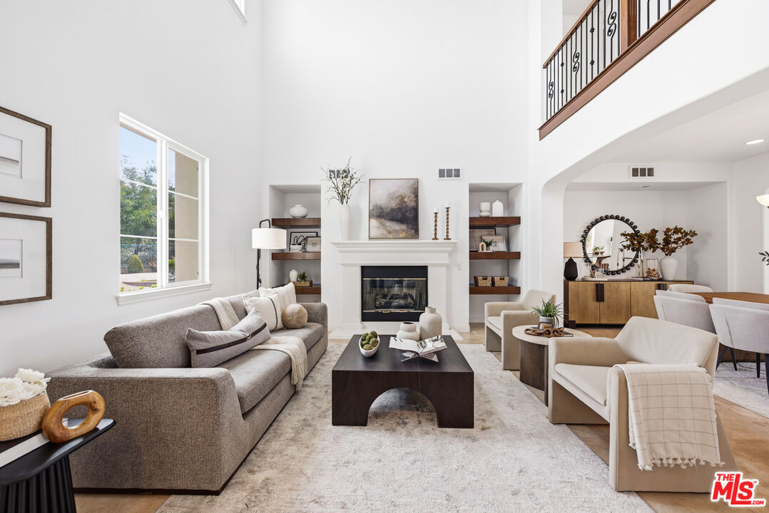 3447 Sentinel Court Simi Valley, CA 93065 - Photo 3 of 19 a living room with furniture and a fireplace