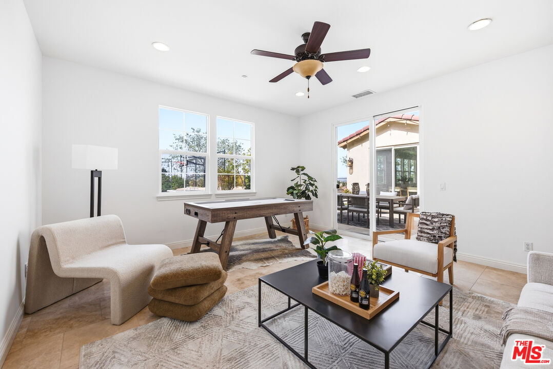 3447 Sentinel Court Simi Valley, CA 93065 - Photo 7 of 19 a living room with furniture and a large window
