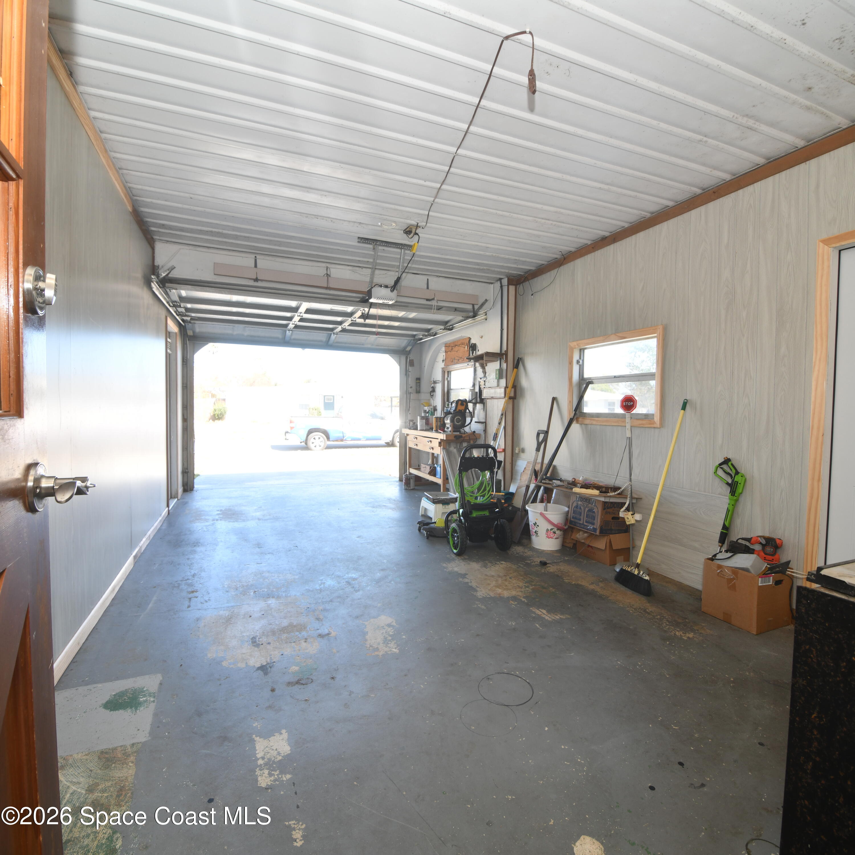 839 Angle Street Northeast Palm Bay, FL 32905 - Photo 20 of 21 a view of a room with gym equipment