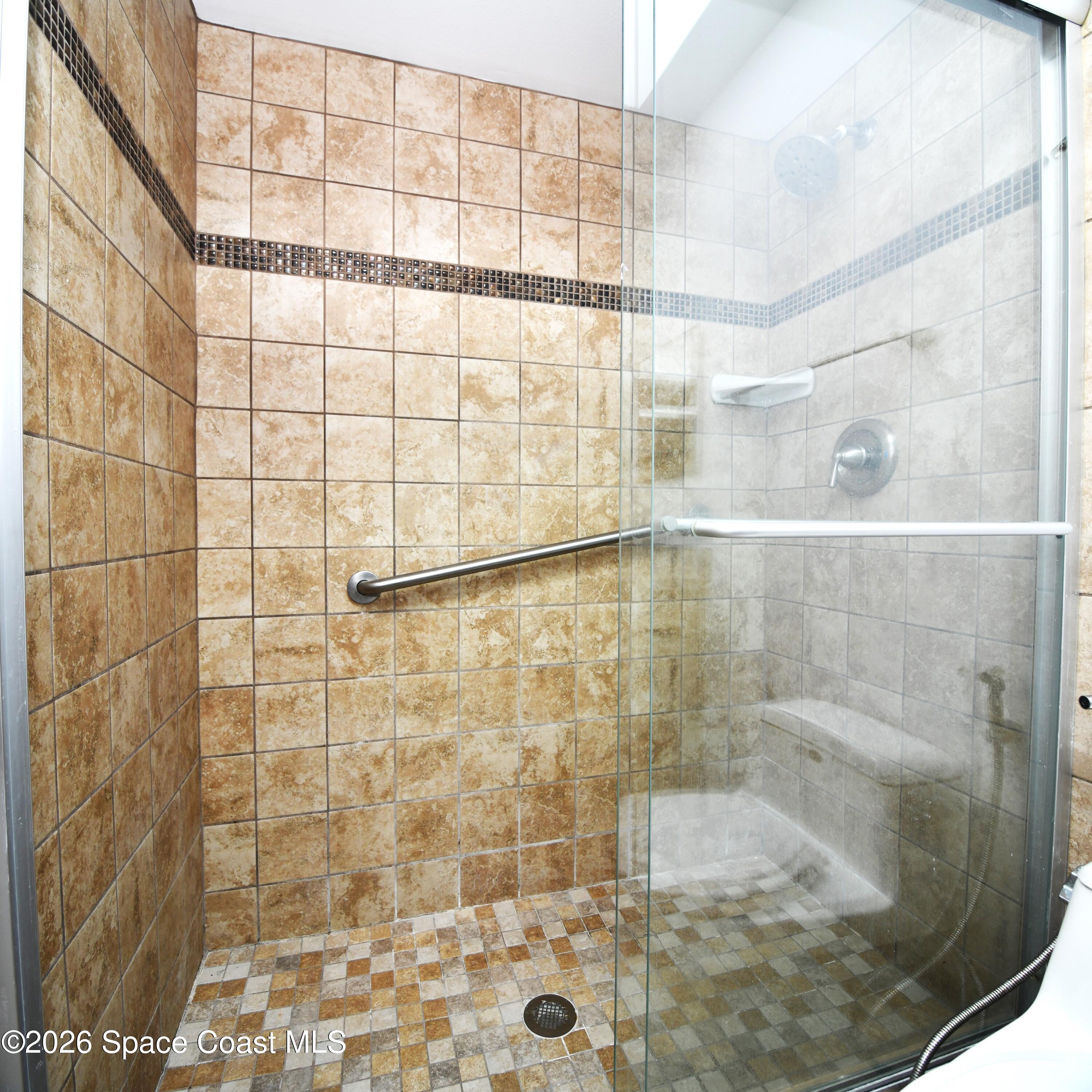 839 Angle Street Northeast Palm Bay, FL 32905 - Photo 10 of 21 a bathroom with a shower