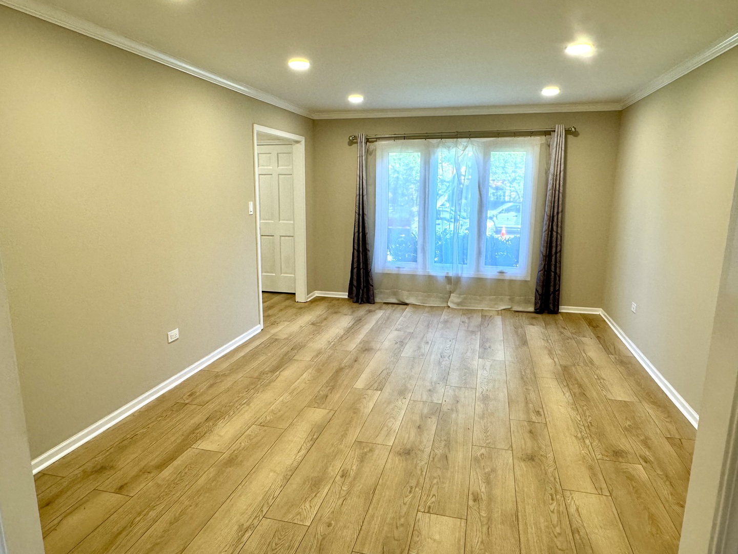 1398 East Gartner Road Naperville, IL 60540 - Photo 4 of 31 a view of an empty room with a window
