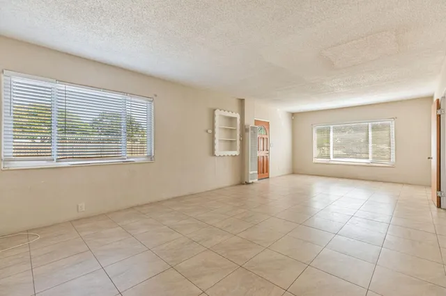 a view of hallway with windows
