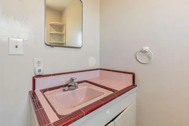 a view of a swimming pool and an ocean view