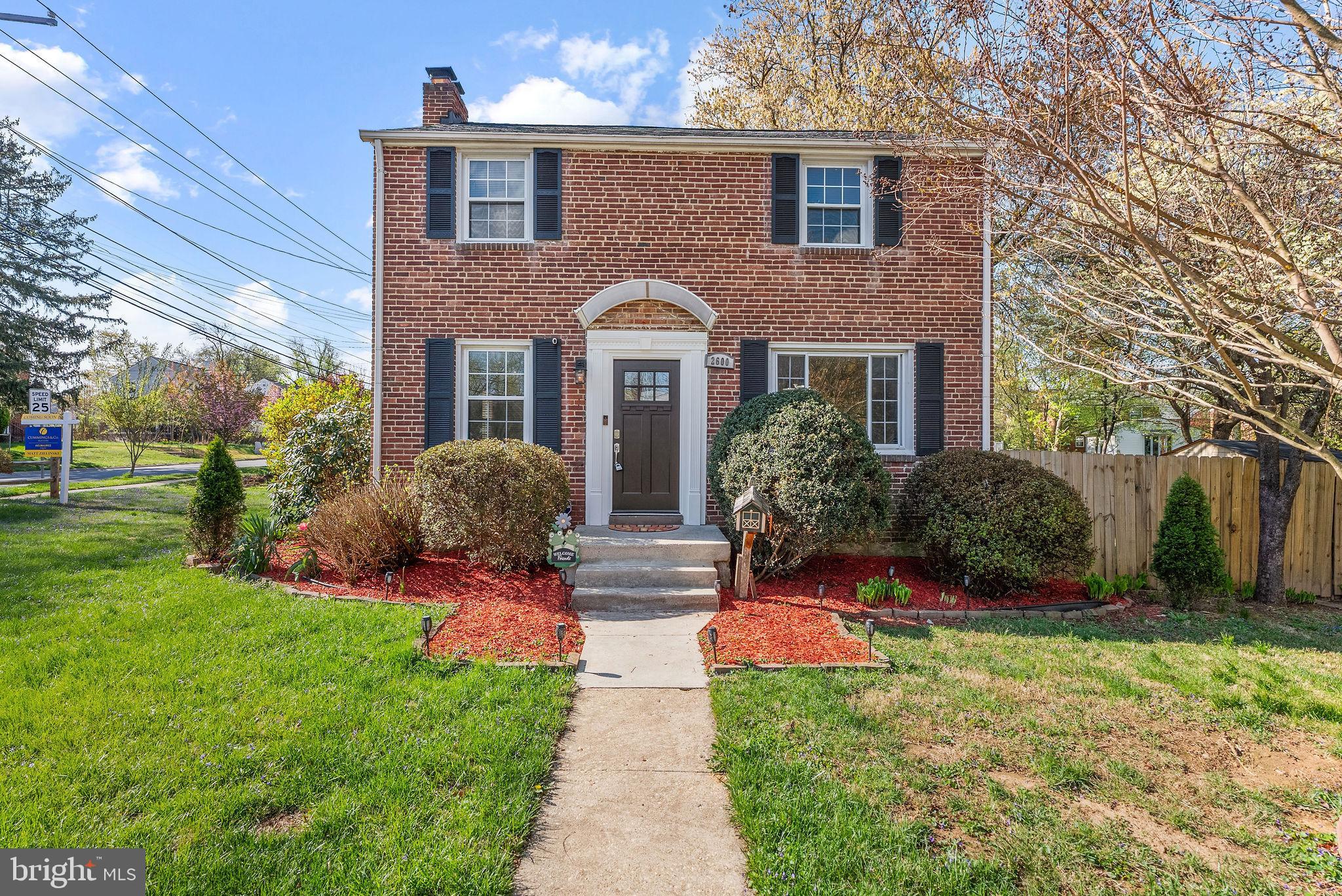 2600 Arcola Avenue Silver Spring, MD 20902 - Photo 2 of 39 a front view of a house with yard and green space