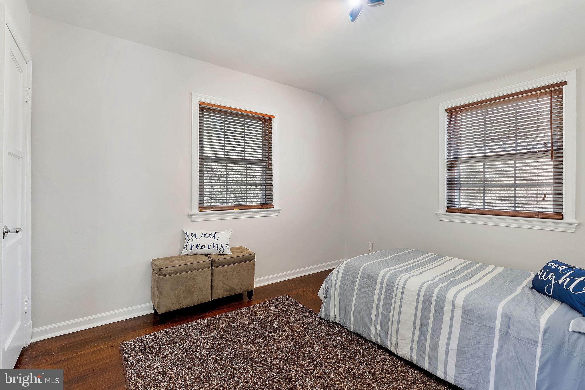 2600 Arcola Avenue Silver Spring, MD 20902 - Photo 27 of 39 a bedroom with a bed and a window