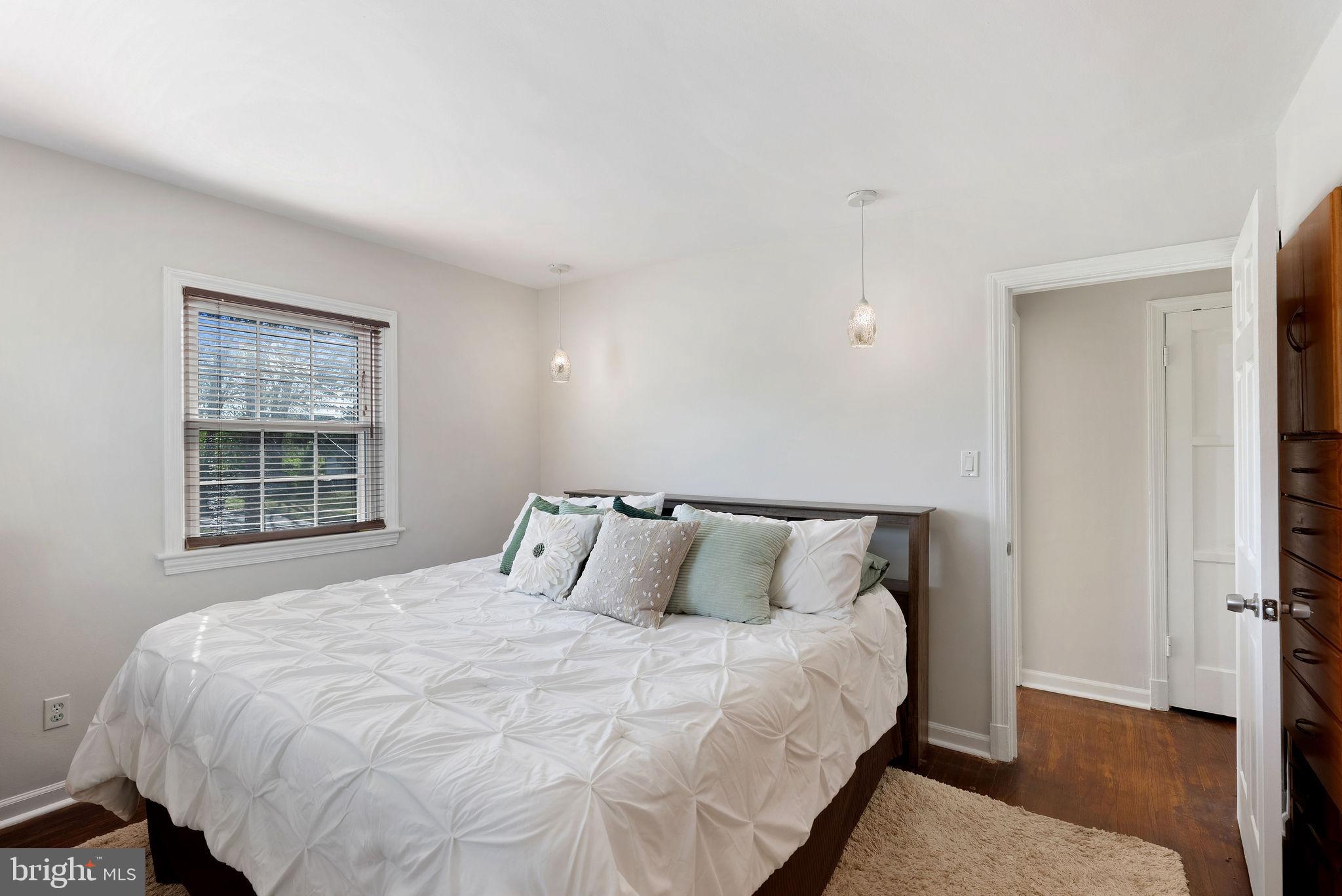 2600 Arcola Avenue Silver Spring, MD 20902 - Photo 30 of 39 a bedroom with a bed and a window