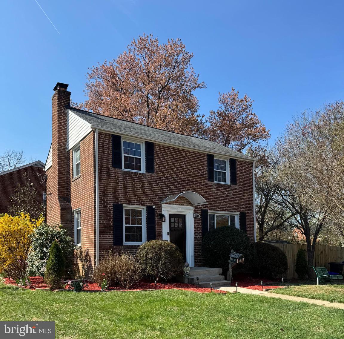 2600 Arcola Avenue Silver Spring, MD 20902 - Photo 3 of 39 a front view of a house with a garden