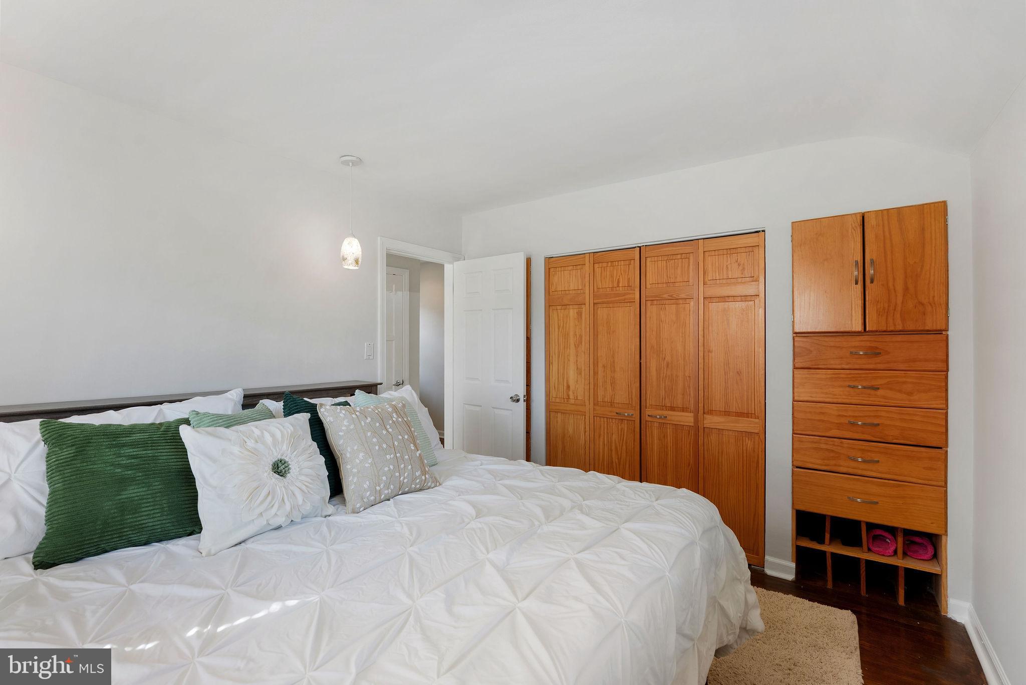 2600 Arcola Avenue Silver Spring, MD 20902 - Photo 31 of 39 a bedroom with a bed and a closet