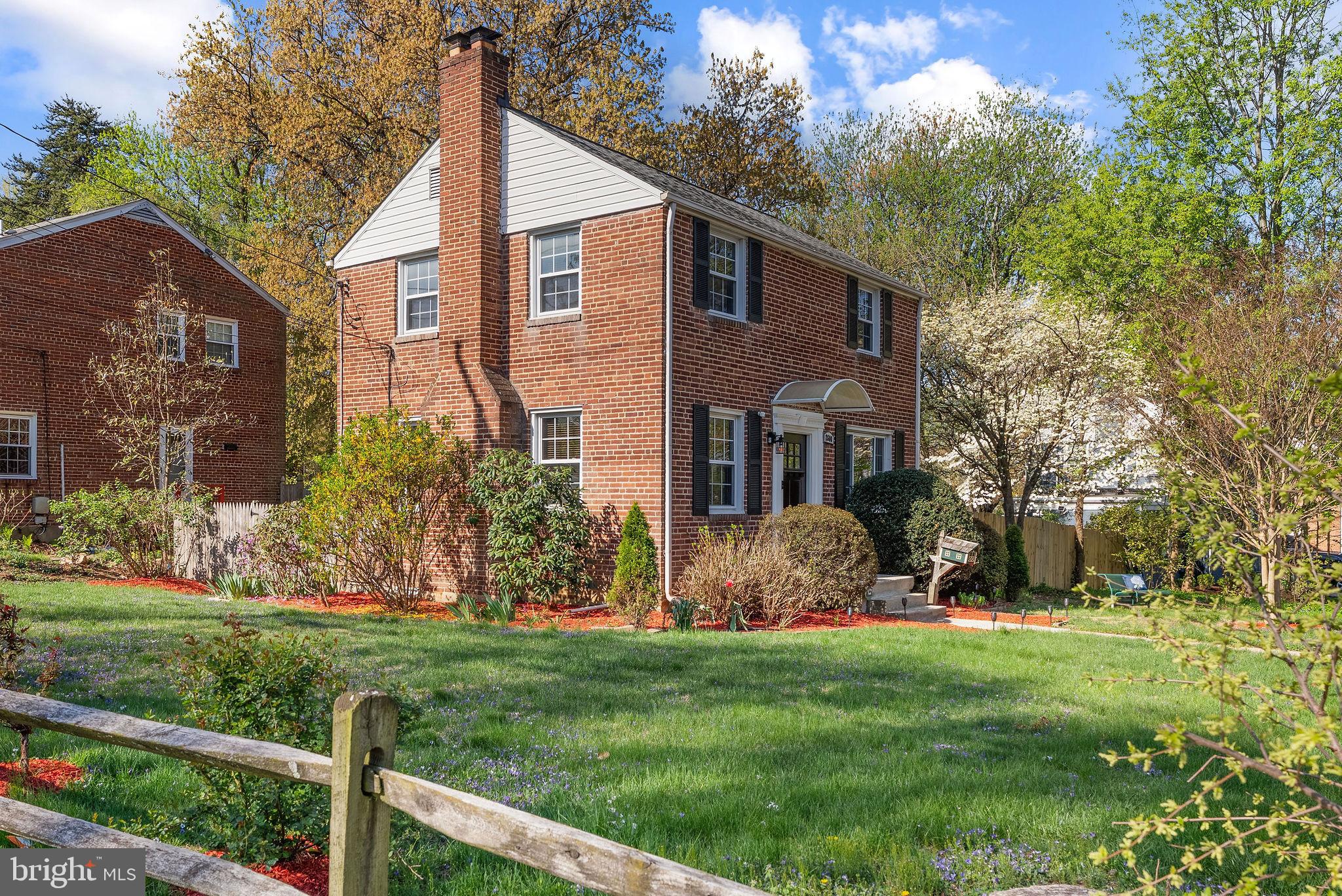 2600 Arcola Avenue Silver Spring, MD 20902 - Photo 5 of 39 a front view of a house with garden