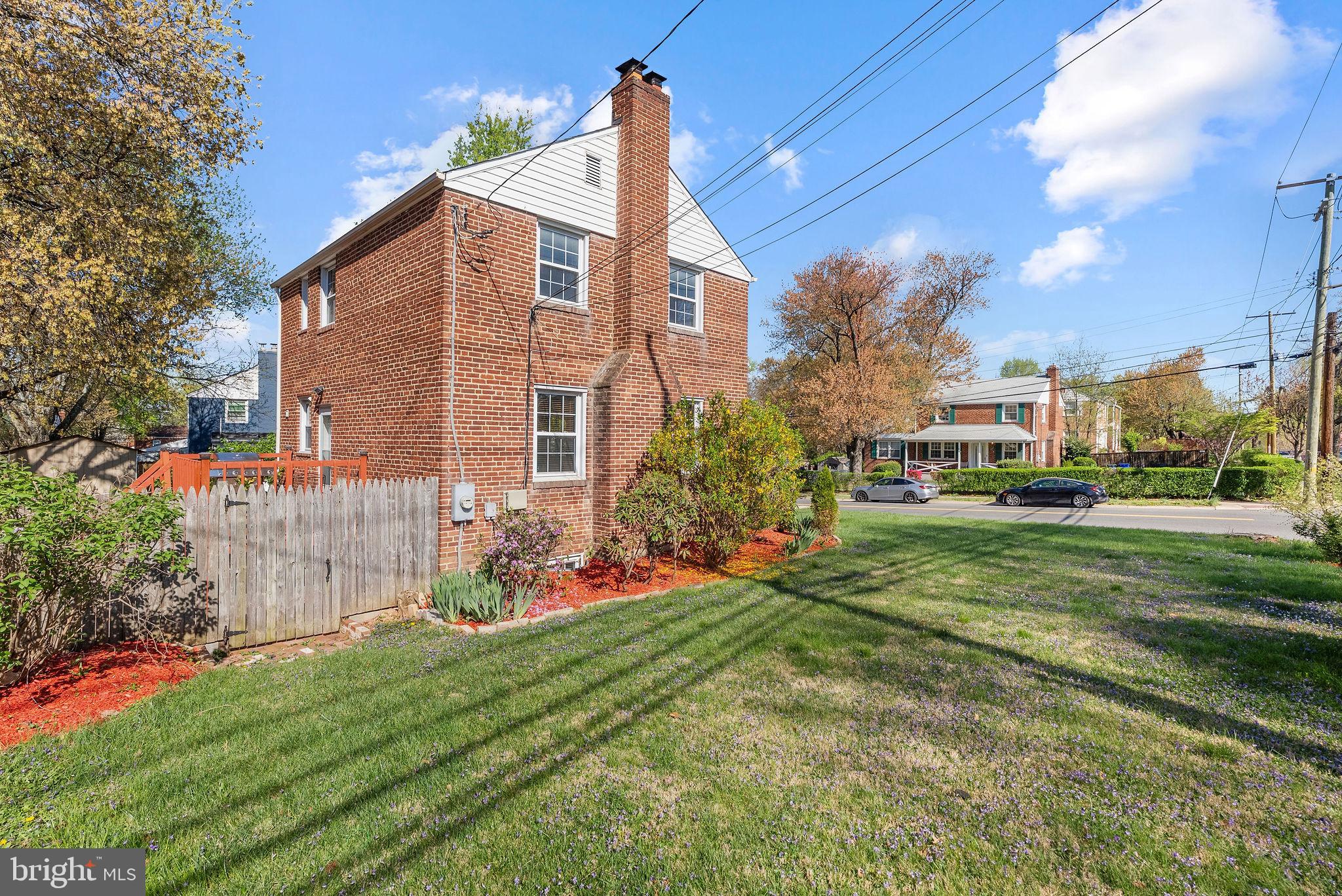 2600 Arcola Avenue Silver Spring, MD 20902 - Photo 6 of 39 a front view of a house with garden