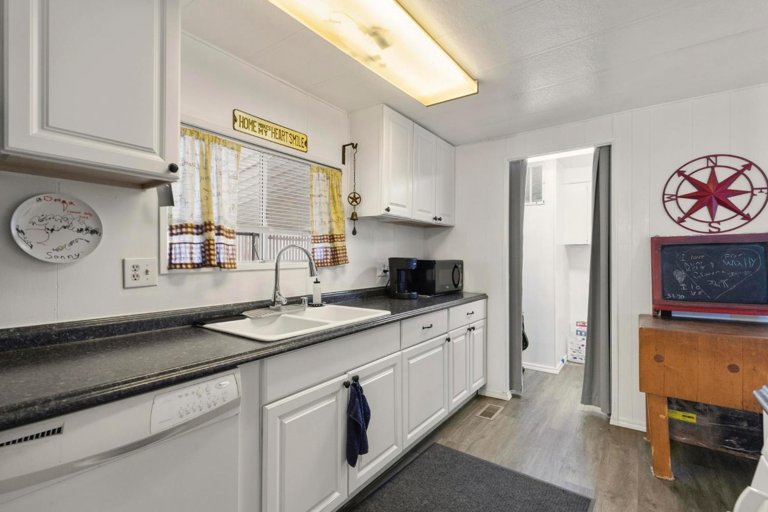 10383 Larkin Road, Unit 15 Live Oak, CA 95953 - Photo 15 of 32 a kitchen with stainless steel appliances granite countertop a sink and a stove