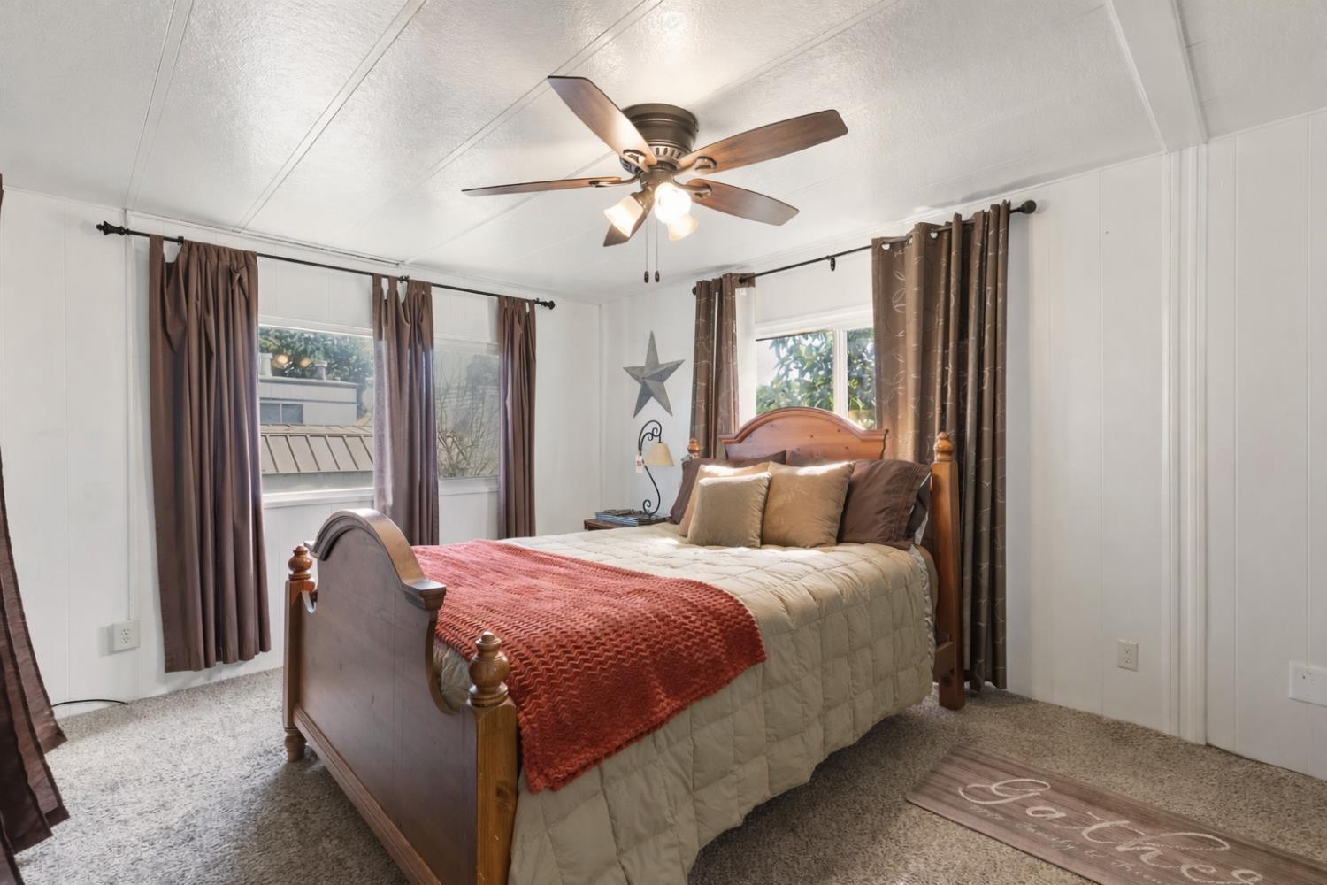10383 Larkin Road, Unit 15 Live Oak, CA 95953 - Photo 19 of 32 a bedroom with a bed and window