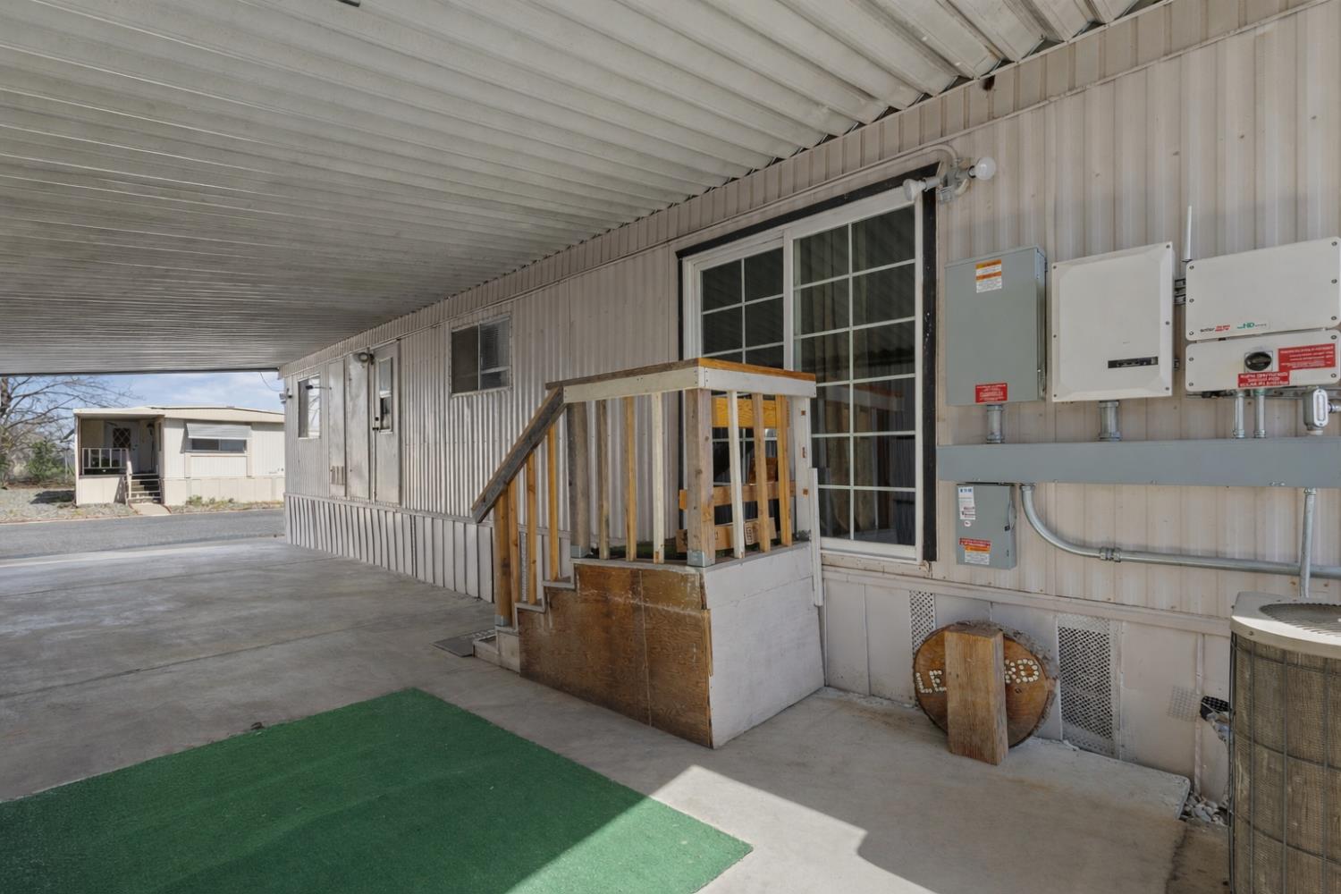 10383 Larkin Road, Unit 15 Live Oak, CA 95953 - Photo 2 of 32 a view of an house with backyard and a garden