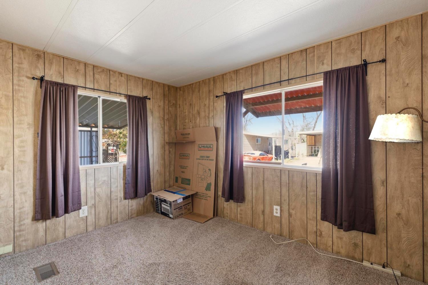10383 Larkin Road, Unit 15 Live Oak, CA 95953 - Photo 24 of 32 a view of room with window and wardrobe