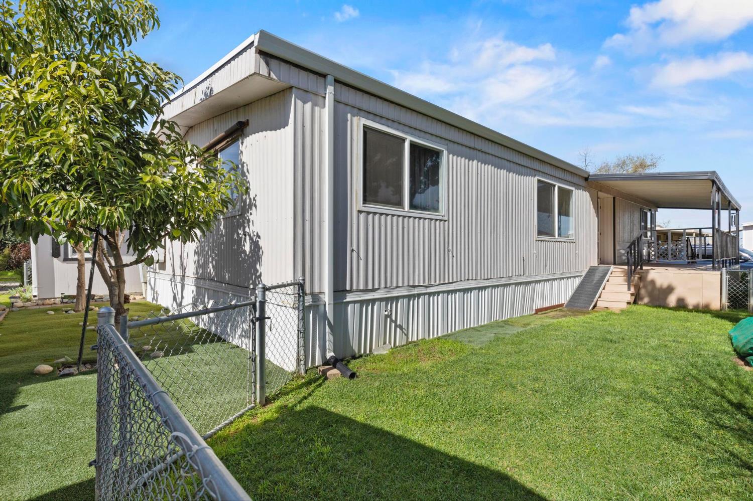 10383 Larkin Road, Unit 15 Live Oak, CA 95953 - Photo 31 of 32 a house view with a garden space