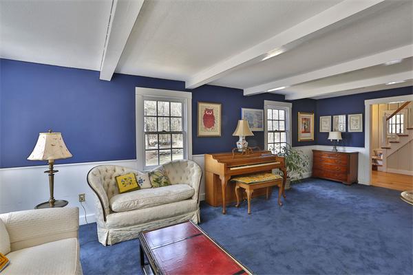 123 East Bare Hill Road Harvard, MA 01451 - Photo 11 of 19 a bedroom with a bed wooden floor and a lamp on table