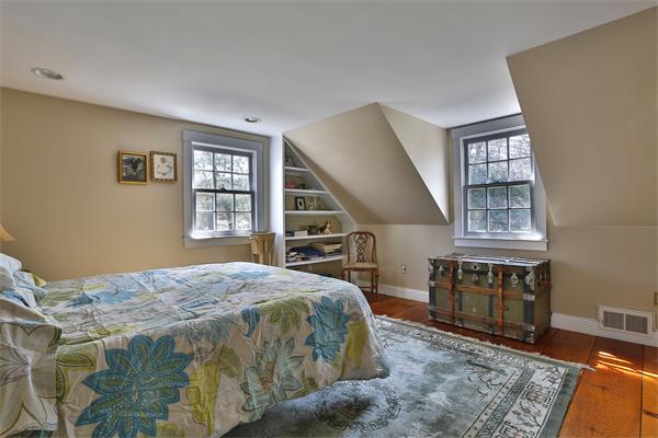 123 East Bare Hill Road Harvard, MA 01451 - Photo 17 of 19 a bed sitting in a bedroom next to a window