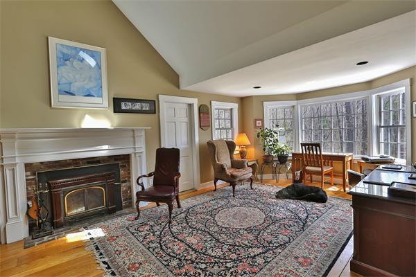 123 East Bare Hill Road Harvard, MA 01451 - Photo 6 of 19 a living room with furniture and a fireplace