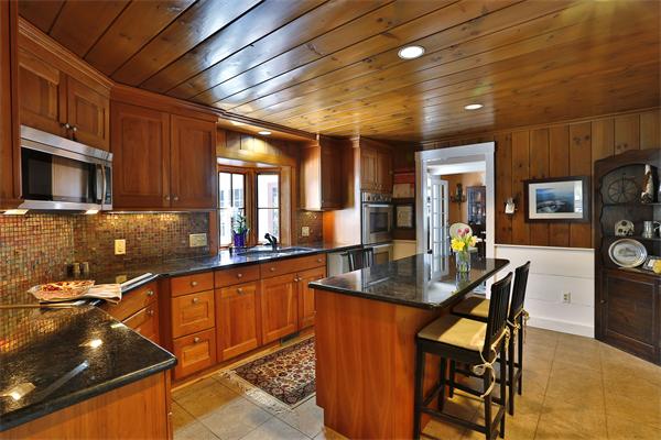 123 East Bare Hill Road Harvard, MA 01451 - Photo 10 of 19 a kitchen with stainless steel appliances granite countertop a sink a stove counter space and chairs