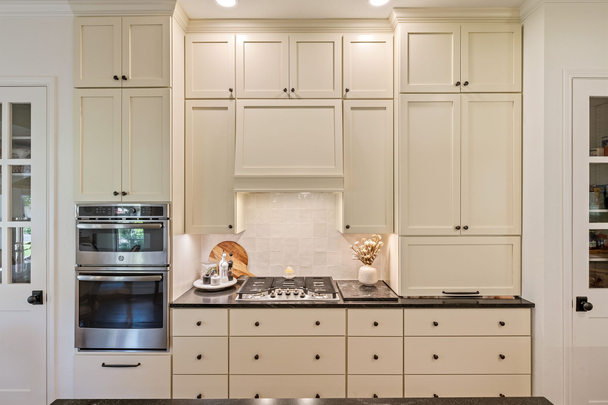 118 Cold Springs Drive Georgetown, TX 78633 - Photo 17 of 40 Prepare culinary delights in a kitchen featuring dual ovens, a gas cooktop, and abundant cabinetry.