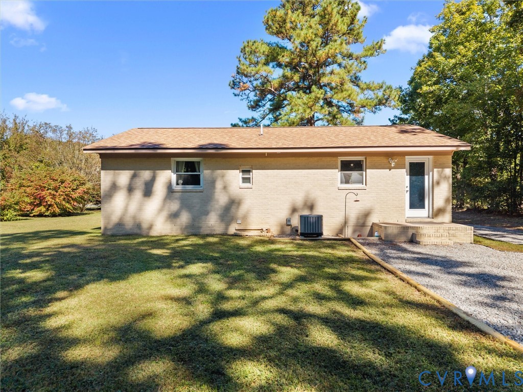 408 Howerton Road Tappahannock, VA 22560 - Photo 45 of 49 Single-story exterior with a light-colored brick f