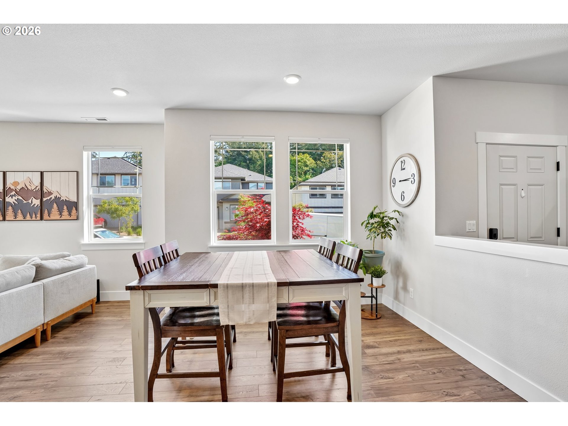16823 Southwest Colorado Lane Tigard, OR 97224 - Photo 15 of 48 a view of a dining room with furniture and wooden floor