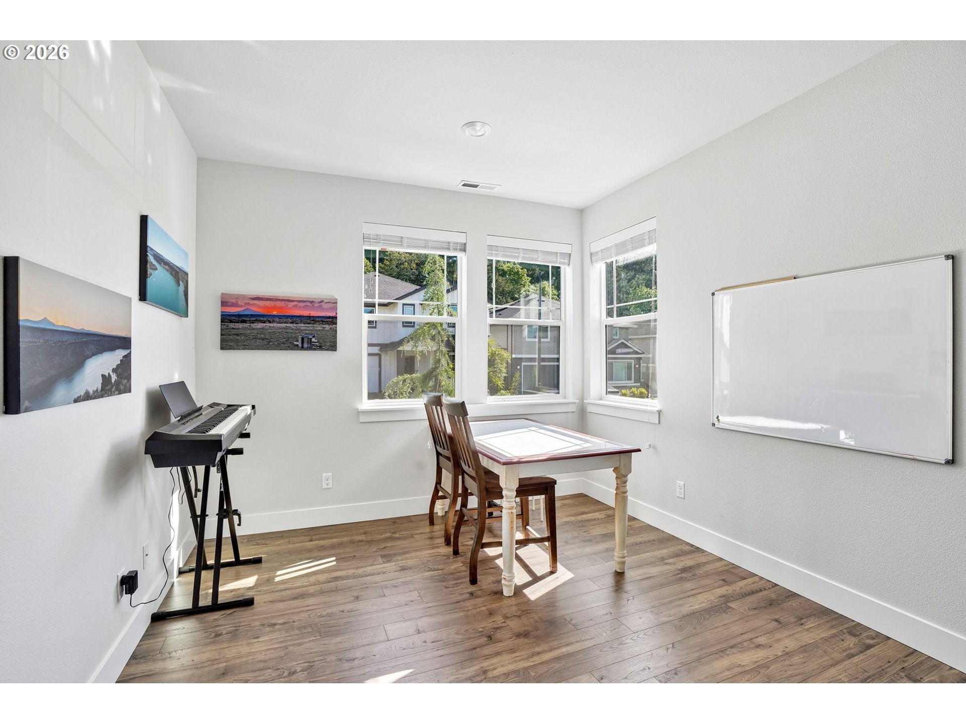 16823 Southwest Colorado Lane Tigard, OR 97224 - Photo 32 of 48 a view of a room with furniture window and wooden floor