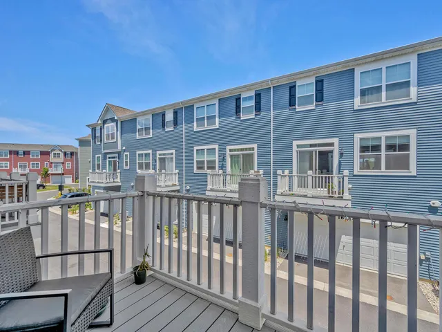 a view of a brick building from a balcony