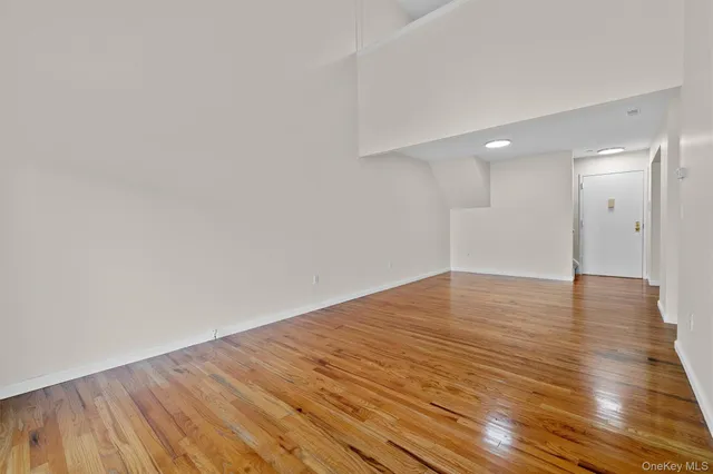 a view of a balcony with large window