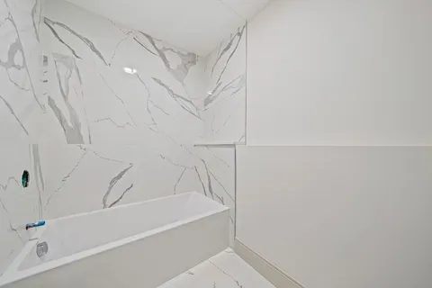 a bathroom with a bathtub