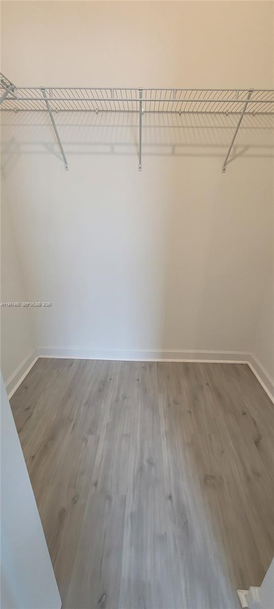 12470 Southwest 248th Street, Unit 5 Homestead, FL 33032 - Photo 11 of 18 a view of a room with racks on the wall