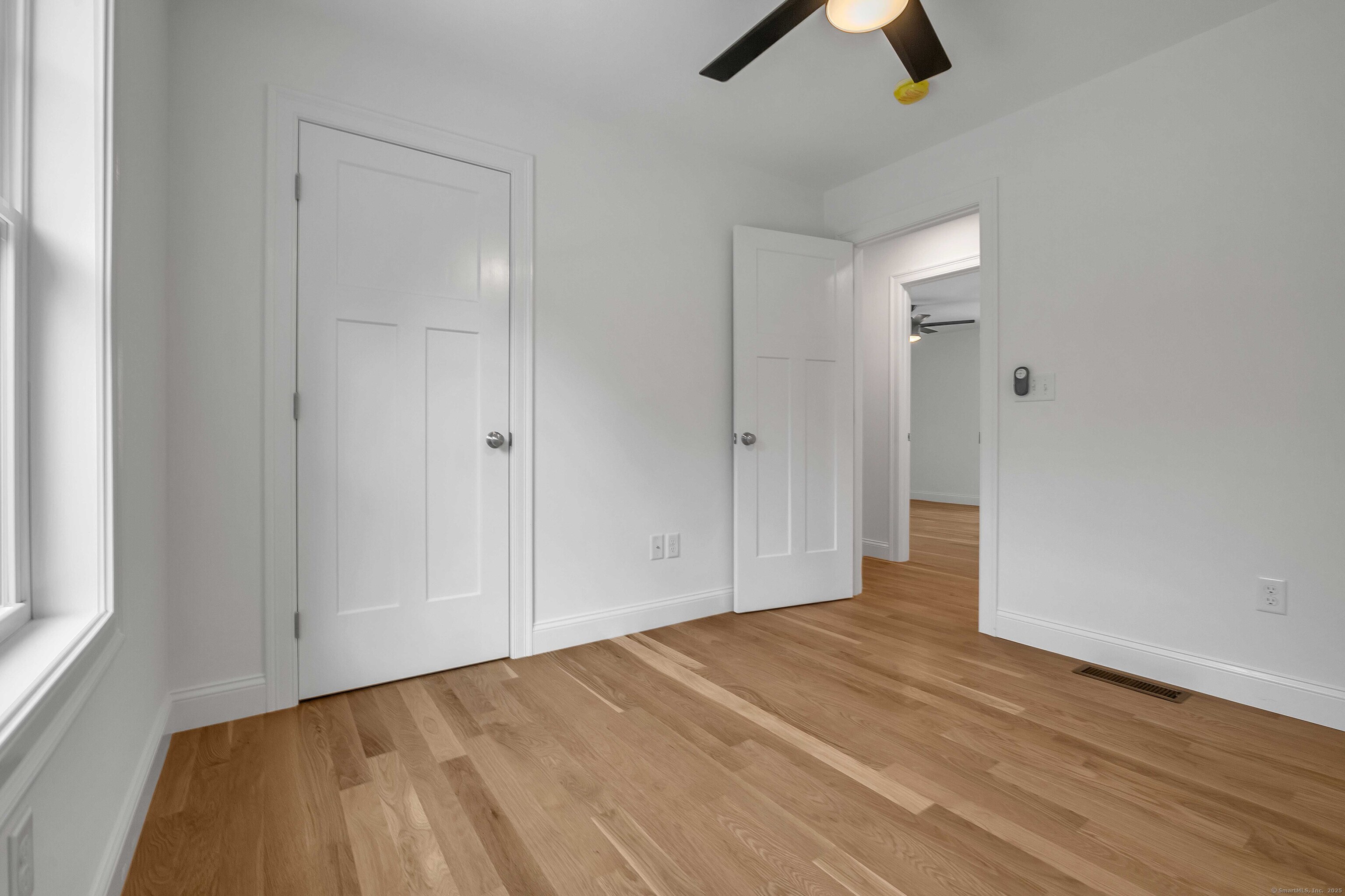 4 Lake Of Isles Road North Stonington, CT 06359 - Photo 14 of 23 wooden floor in an empty room