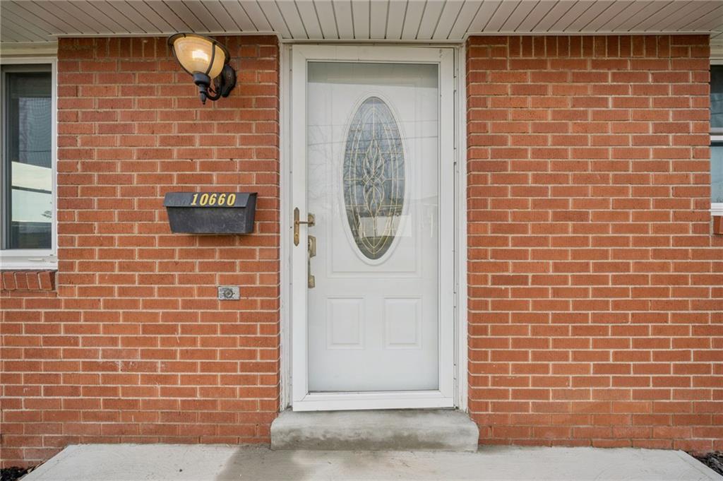 10660 Crestview Drive Irwin, PA 15642 - Photo 2 of 31 a brick building with a door