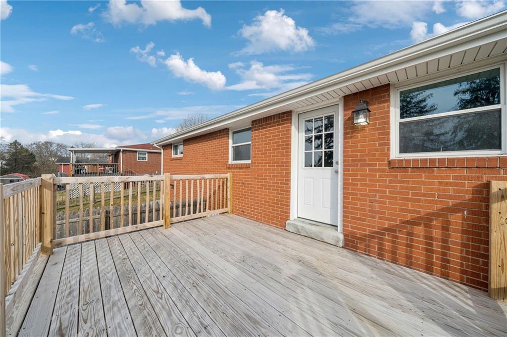 10660 Crestview Drive Irwin, PA 15642 - Photo 22 of 31 a view of backyard with a deck