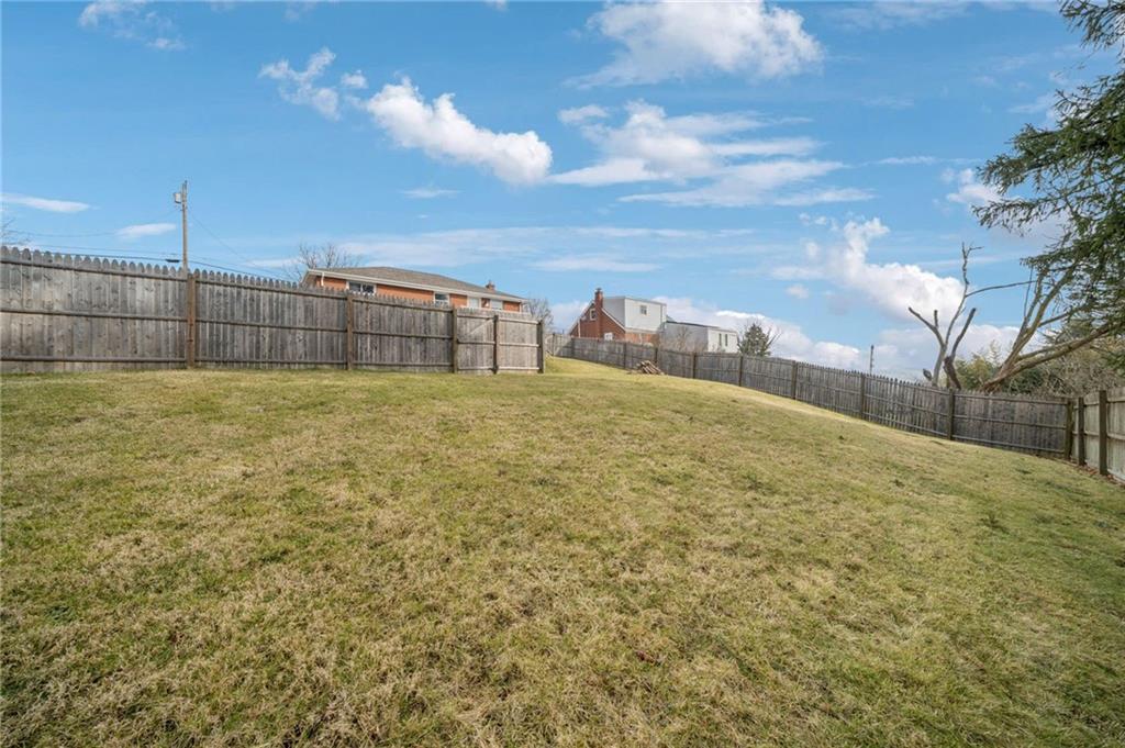 10660 Crestview Drive Irwin, PA 15642 - Photo 25 of 31 a view of a yard with a building