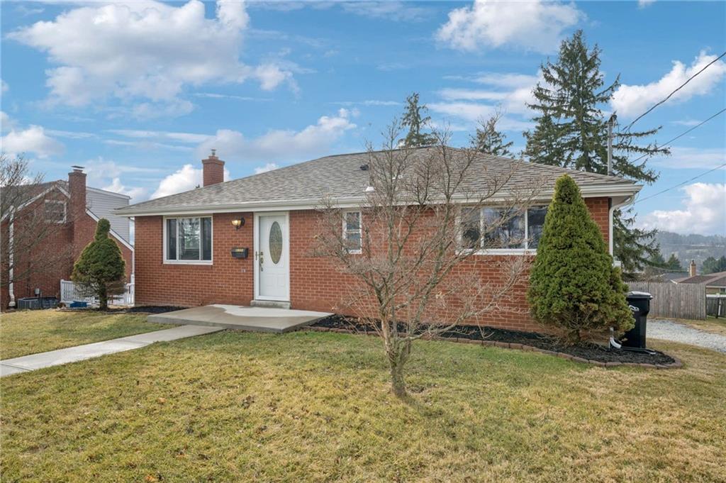 10660 Crestview Drive Irwin, PA 15642 - Photo 28 of 31 a front view of a house with a yard