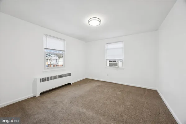 an empty room with a workbench