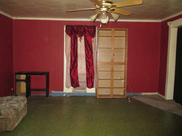 140 Woodlawn Road Pulaski, TN 38478 - Photo 3 of 20 a view of a room with music instruments