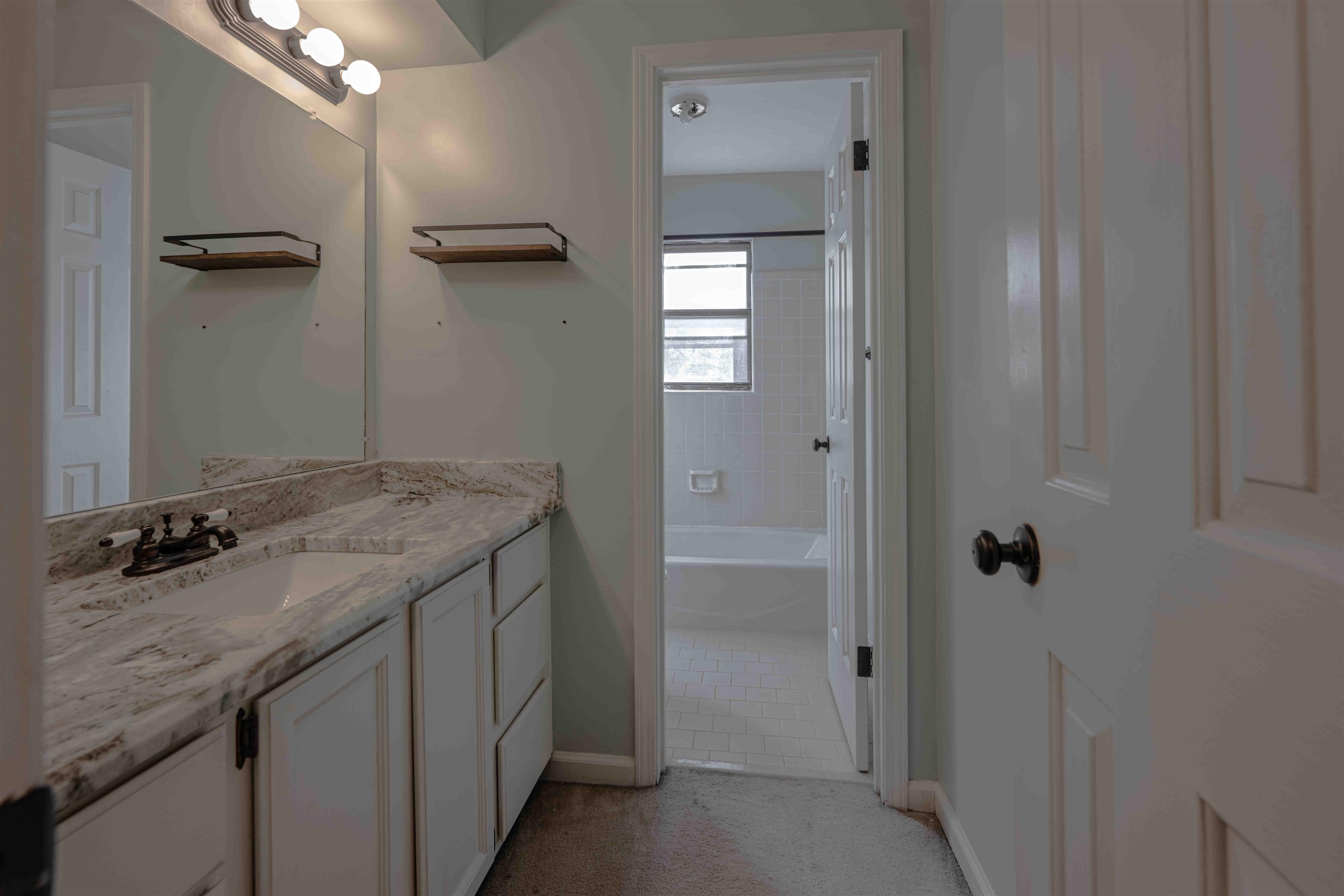 8883 Farmoor Road Germantown, TN 38139 - Photo 29 of 34 Full bathroom with vanity and tub / shower combination