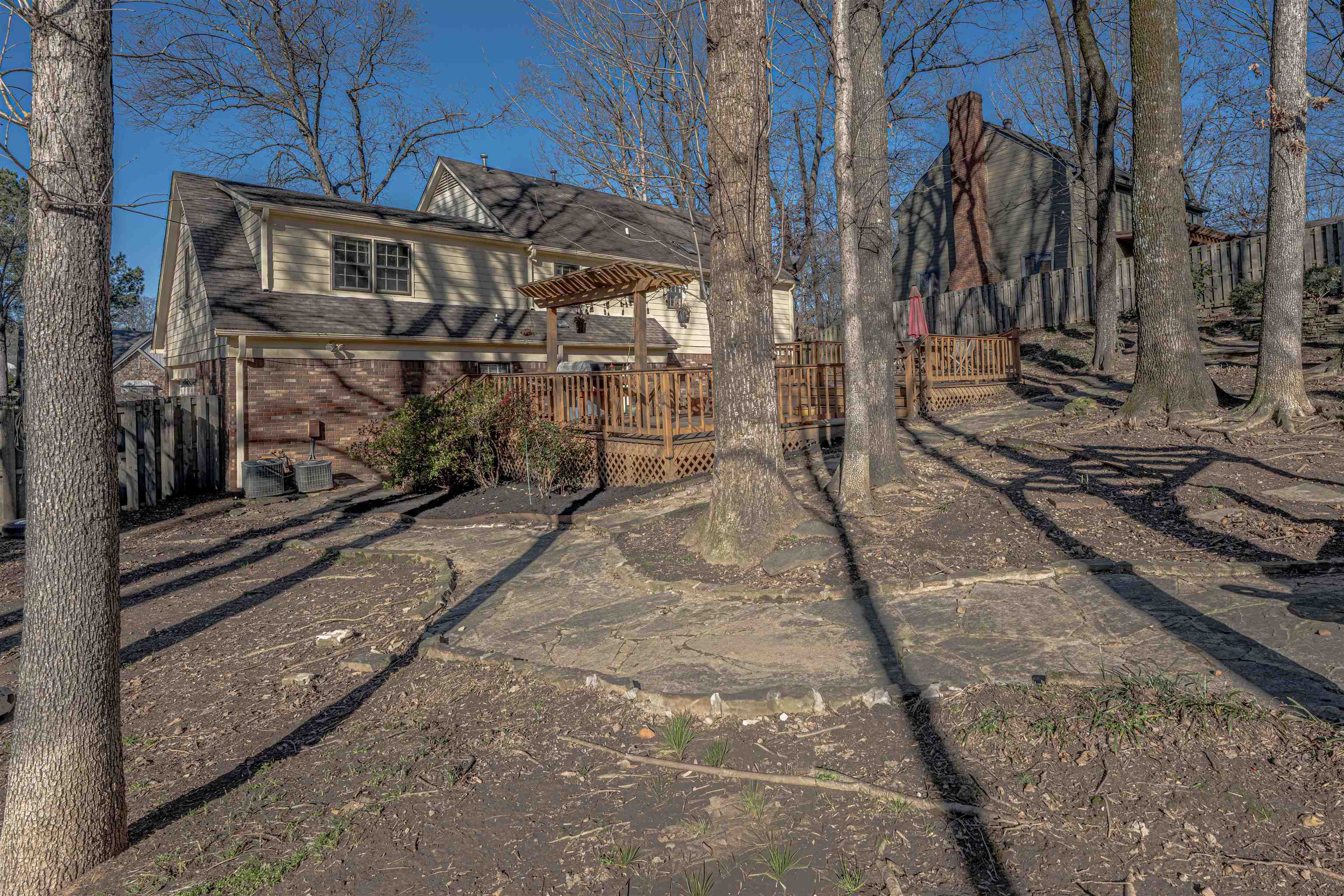 8883 Farmoor Road Germantown, TN 38139 - Photo 33 of 34 View of front of property featuring brick siding and a wooden deck