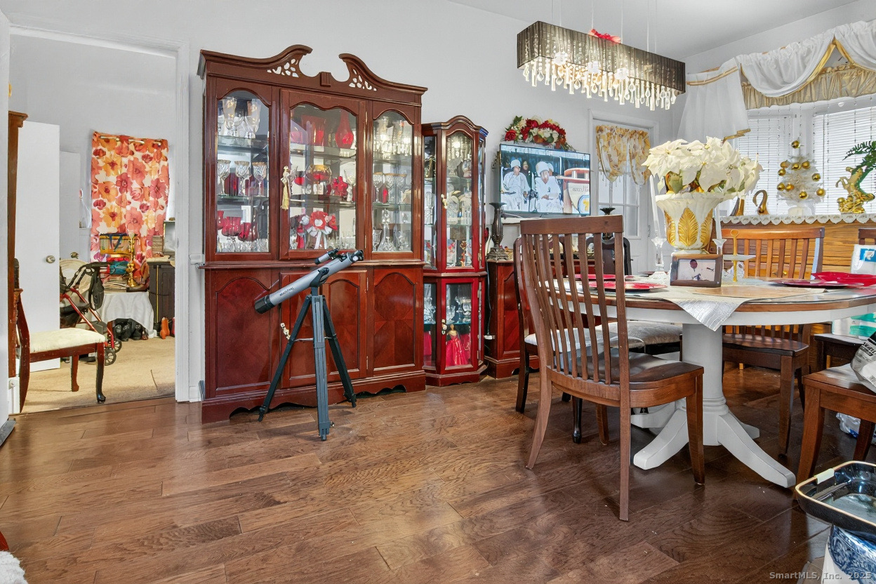 855 Oronoke Road, Unit 2 Waterbury, CT 06708 - Photo 3 of 12 a view of a room with lots of furniture and windows
