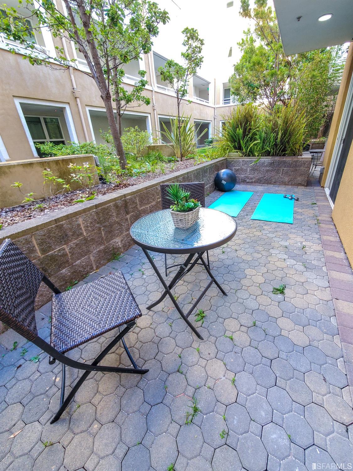 301 Crescent Court, Unit 3117 San Francisco, CA 94134 - Photo 18 of 34 a front view of a house with garden