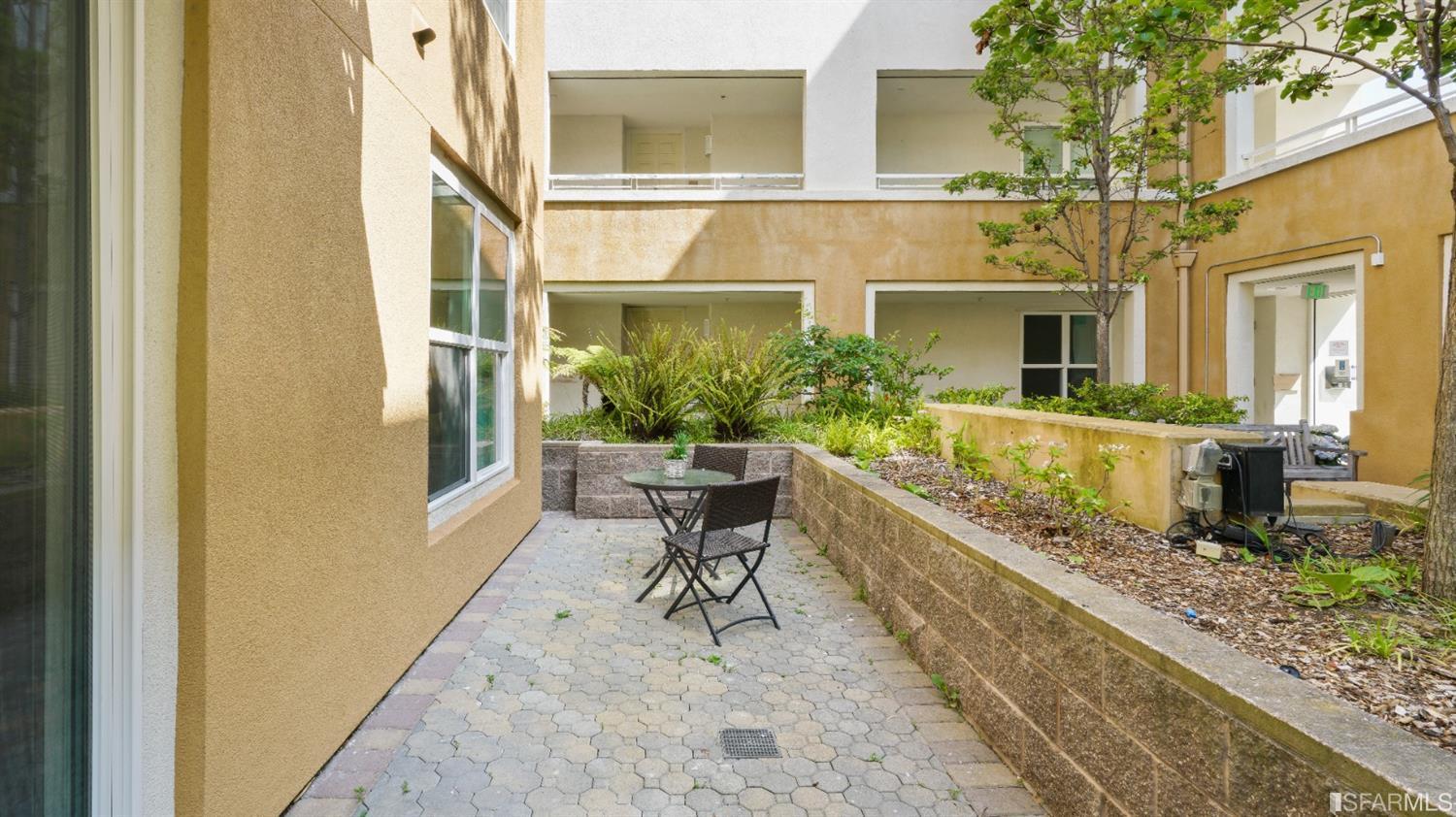 301 Crescent Court, Unit 3117 San Francisco, CA 94134 - Photo 19 of 34 a house view with a seating space and garden area