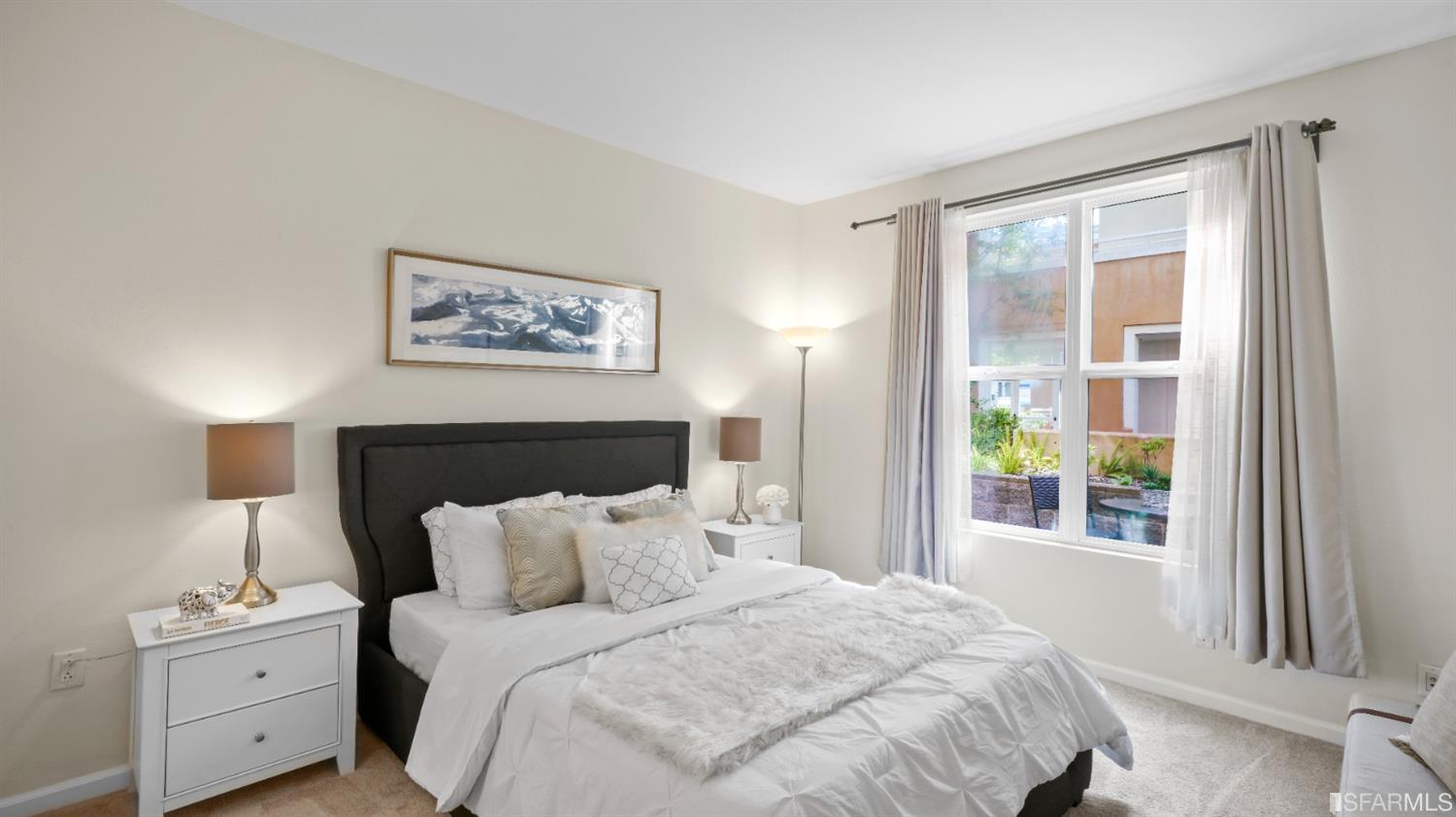 301 Crescent Court, Unit 3117 San Francisco, CA 94134 - Photo 8 of 34 a bedroom with a bed and a window