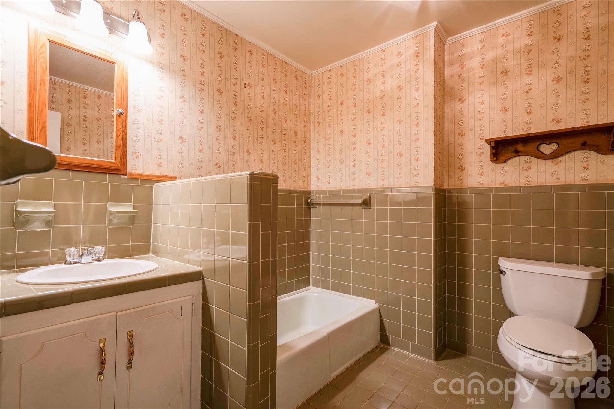 431 North Main Street Shelby, NC 28152 - Photo 17 of 37 a bathroom with a sink a toilet and shower