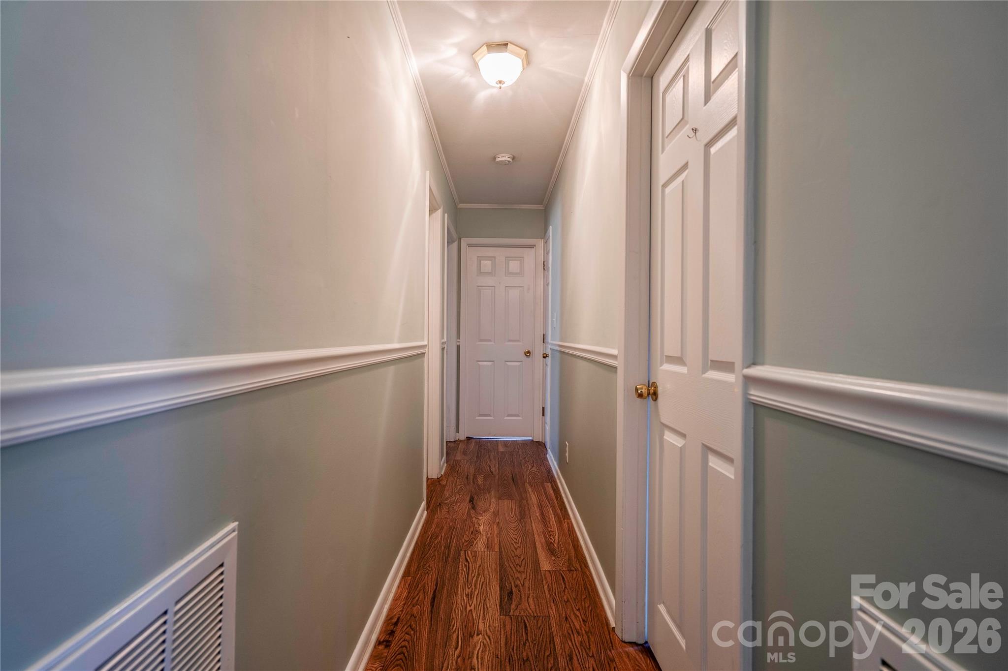431 North Main Street Shelby, NC 28152 - Photo 19 of 37 a view of a hallway with wooden floor and staircase