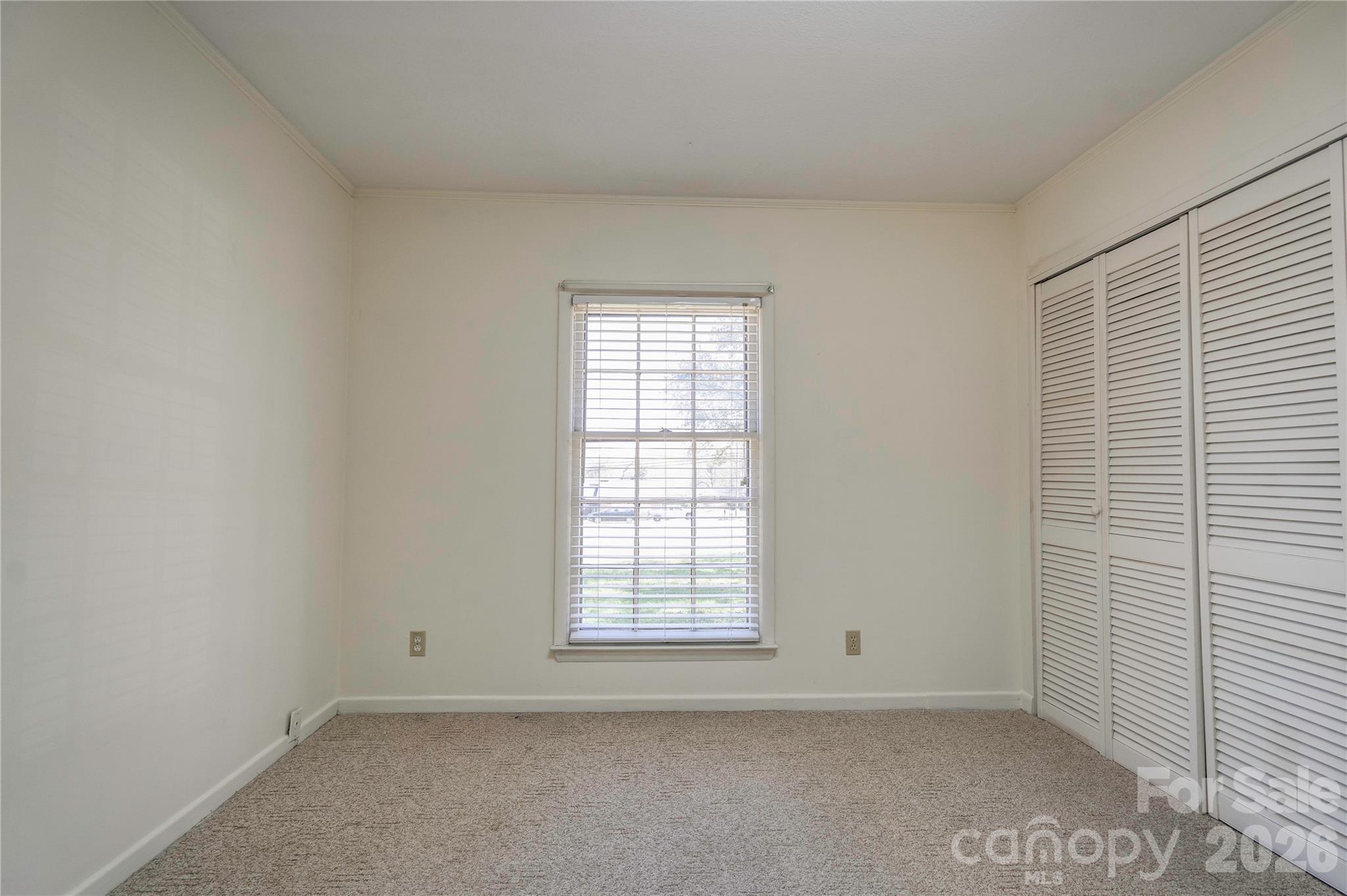 431 North Main Street Shelby, NC 28152 - Photo 21 of 37 an empty room with a window